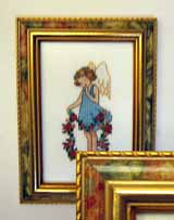 Вышивка «Девочка с цветами» 15х10
(рамка, стекло антиблик, задник, установка, натяжка)
