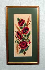 Вышивка «Маки» 48,5х20
(рамка деревянная , стекло антибликовое, оргалит, установка работы в раму, паспарту, вырез окна в паспарту, натяжка вышивки)
